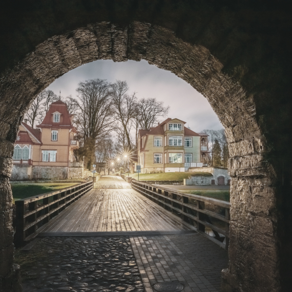 Kuressaare, Saaremaa Island, Estonia. Passage Entrance From Episcopal Castle. Traditional Medieval Architecture, Famous Attraction Landmark. Episcopal Castle In Night. Traditional Medieval